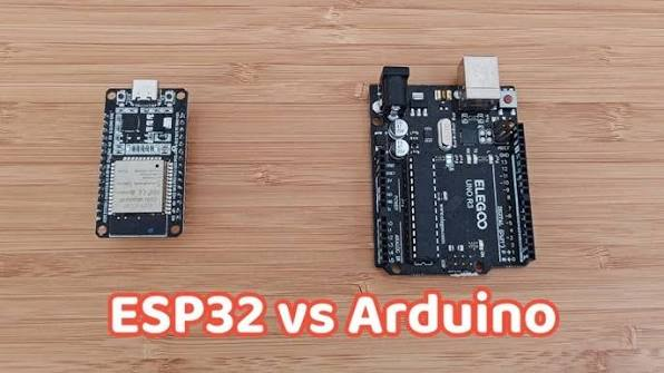 arduino uno r3 next to an esp32 devkit board showing the size difference